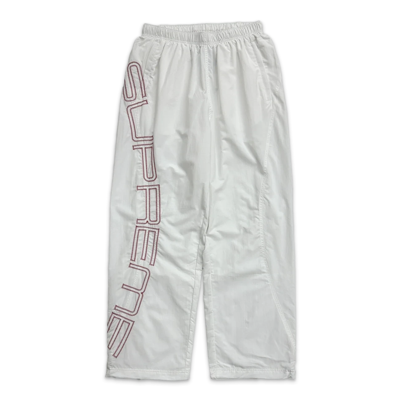 Supreme Embroidered Spellout Track Pants "White"